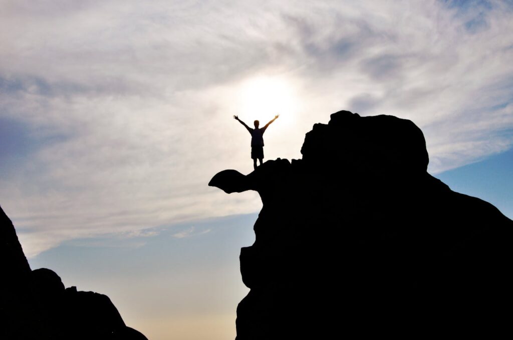 A man climbed up on the mountain top
